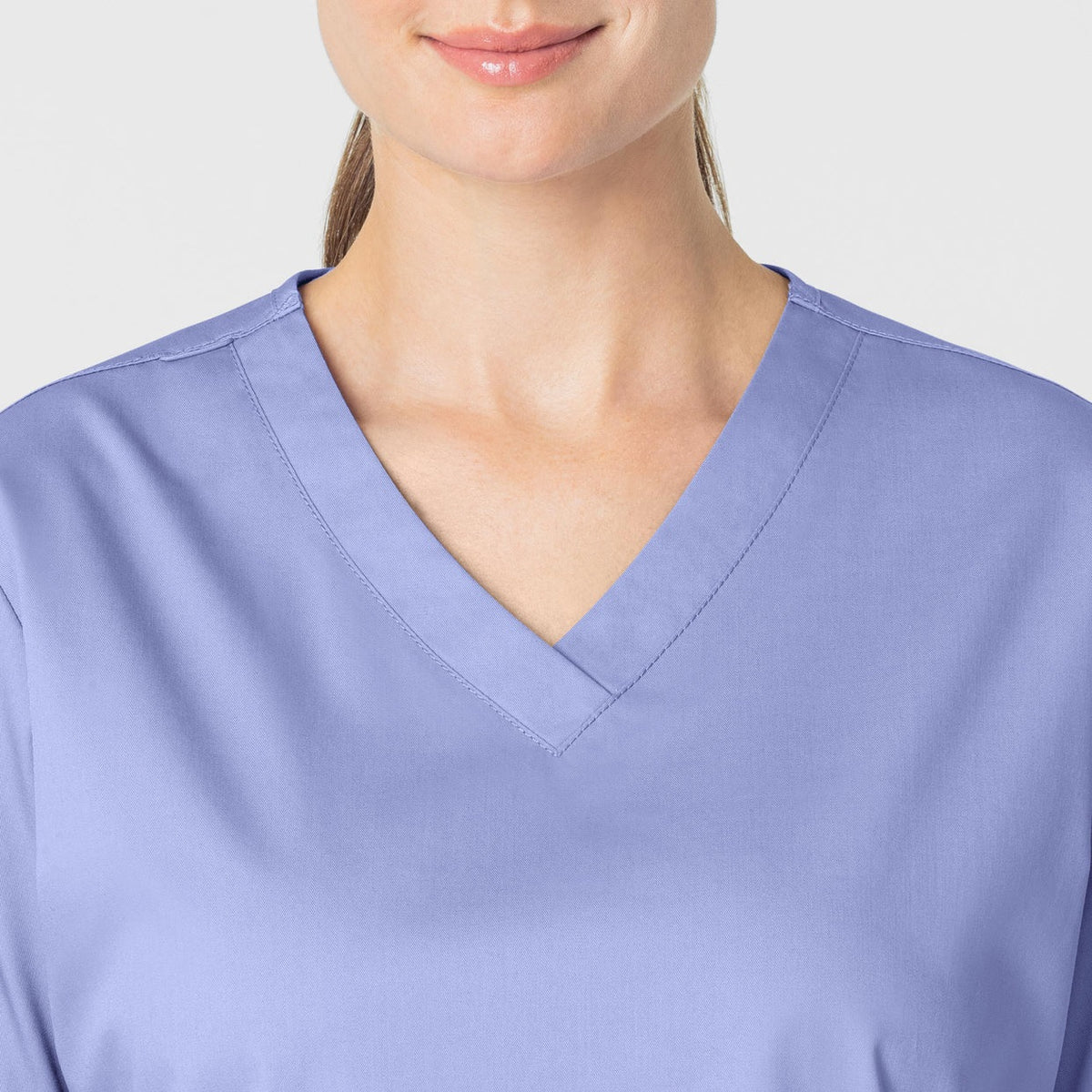 Polera clínica mujer celeste WonderWink WonderWORK, detalle 4 - Uniformes Clínicos Sami