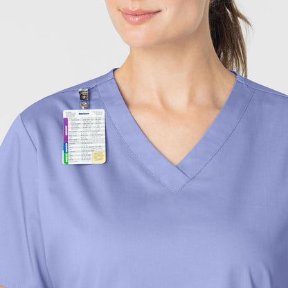 Polera clínica mujer celeste WonderWink WonderWORK, detalle 5 - Uniformes Clínicos Sami