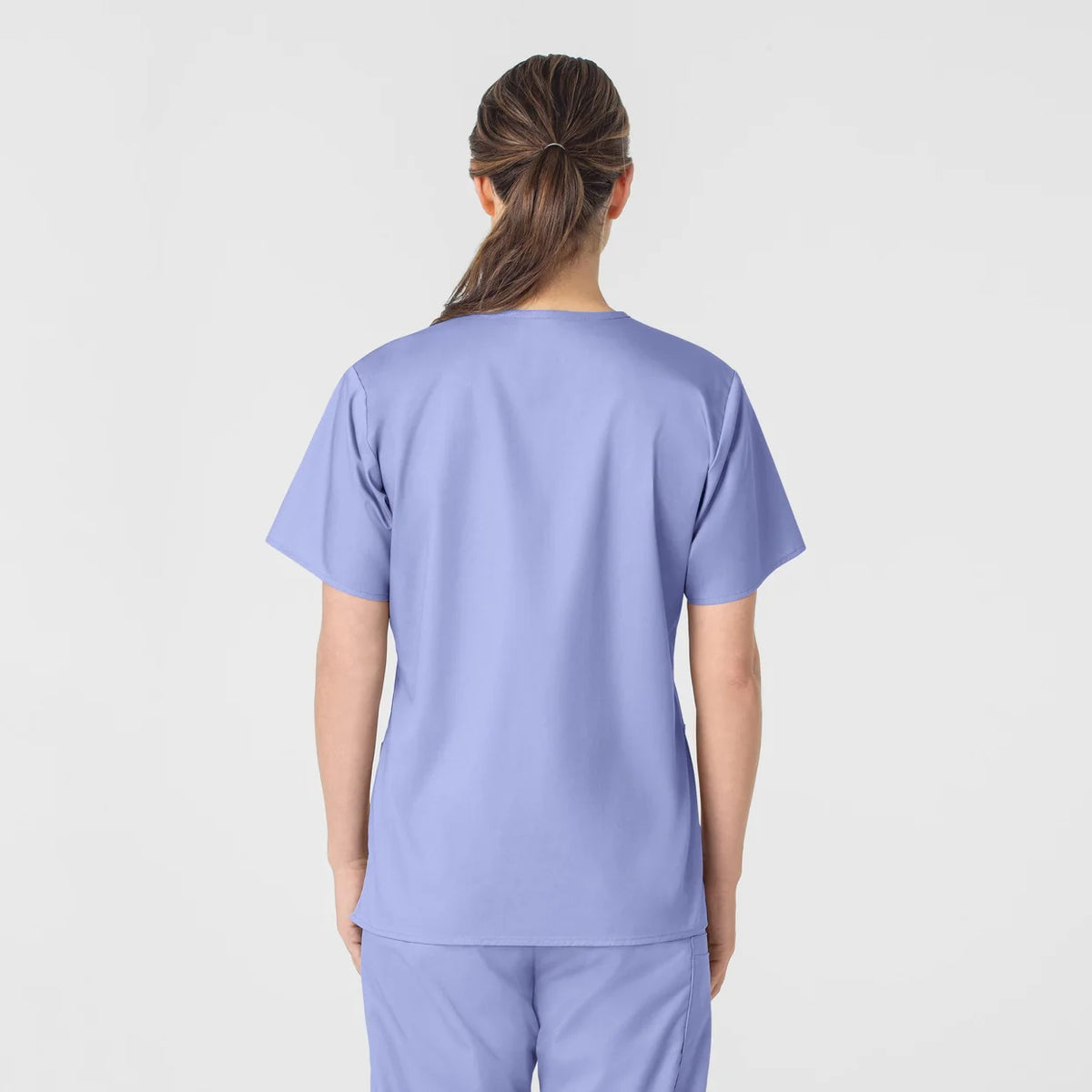 Polera clínica mujer celeste WonderWink WonderWORK, vista trasera - Uniformes Clínicos Sami