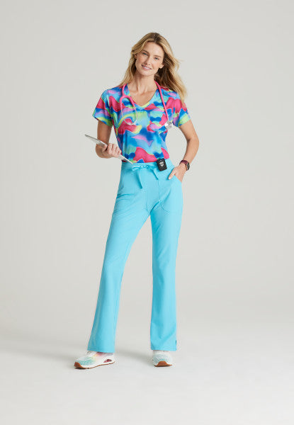 Polera clínica mujer Skechers by Barco Estampada SHMR SKT174, vista trasera - Uniformes Clínicos Sami